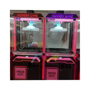 Münzklammer Geschenk-Spielmaschine Glücklicher Planet Clip-Preismaschine Klammer Snacks Geschenk-Verkaufsautomat