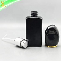 Cosmétique mignon 30ml verre vide rechargeable femmes bouteille de parfum personnalisé verre noir 1oz vaporisateur bouteille de parfum avec bouchon noir