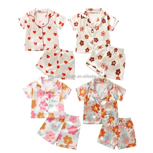 Factory OEM Niños Niñas Pijamas de manga corta Impresión personalizada Material satinado Bebé Niños Botón Ropa de dormir