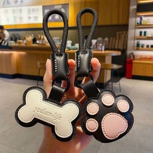 Cartoon PU <b>Cat</b> Paw Pendant Modern Style Bone Cute Car <b>Backpack</b> Decoration Gift Keychain Promotion Customizable - Product Image 1