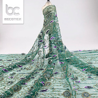Tissu de mariage en dentelle brodée perlée perles et paillettes de luxe tissu en dentelle pour robe de soirée