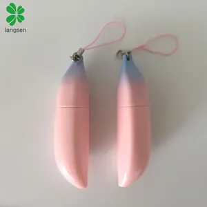 Cute pink colour banana shaped lip balm tube container, fruit shaped plastic lipstick lip balm container with pull ring