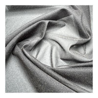Entoilage thermocollant sergé 100 % polyester blanc et noir pour vêtements
