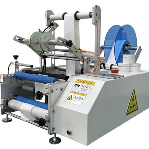 Machine d'étiquetage semi-automatique pour bouteilles rondes, pots en plastique, bouteilles de vin, pots de miel, boîtes de produits quotidiens - Product Image 1