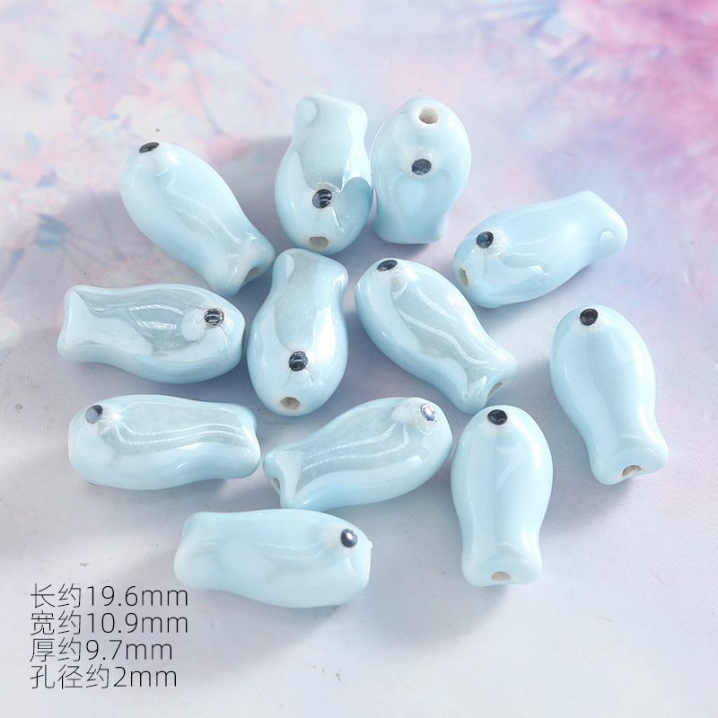 Pez pequeño cerámico electrochapado azul claro (1 pieza)