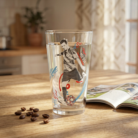 Gobelet en verre imprimé avec un motif d'étoiles sur le thème du football