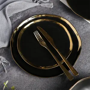 Оптовая продажа, роскошные матовые черные круглые тарелки для дома и ресторана, столовая посуда, керамическая тарелка с золотым ободом