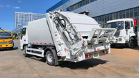 Nouveau camion compacteur d'ordures Isuzu 6-7 CBM à chargement arrière, moteur diesel Euro 6, empattement 3360 mm, boîte de vitesses 4x2, usage municipal