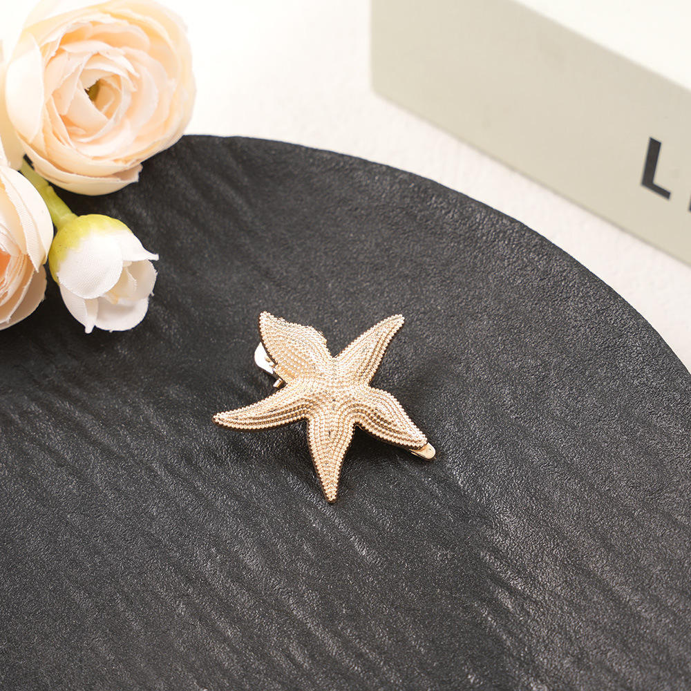 Golden starfish hairpin