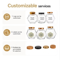 Tarro de miel hexagonal de vidrio con tapa de madera para embalaje de boutique, suministro de fábrica