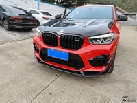 Kit carrosserie en fibre de carbone style AE amélioré pour BMW X4M 23-25 : Lame de pare-chocs avant, jupes latérales, diffuseur arrière et décoration de lame aérodynamique avant