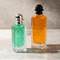 Vente en gros de flacons de parfum en verre rayé de style moyen-oriental de 100/200 ml avec des bouchons argentés et noirs et des pompes à vaporisation fine