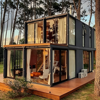 Maison modulaire préfabriquée en conteneur, structure en acier, étanche, avec terrasse en bois, pour usage en villas de glamping et complexes hôteliers, directement de l'usine