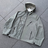 Veste rigide en nylon imperméable personnalisée avec impression cachée activée par la pluie, coupe-vent extérieur respirant pour hommes femmes