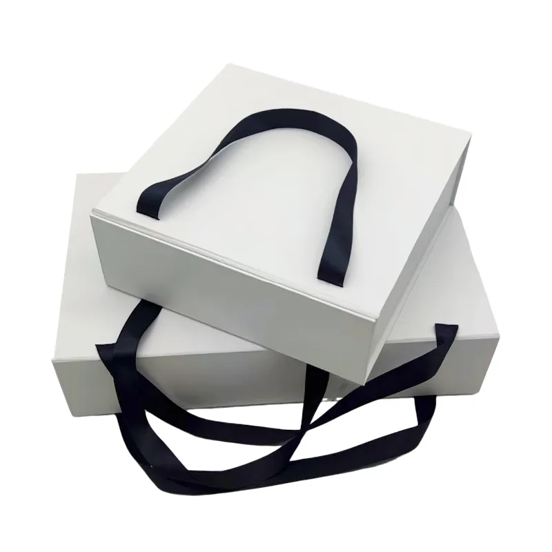 Custom Luxury White Magnet Flap Clothing Paper Box Foldable Magnetic Closure Gift Boxes With Black Ribbon Handle