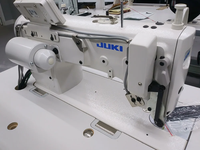 Machine à coudre industrielle à point noué à grande vitesse avec table et servomoteur JUKI DLN-9010A-SH
