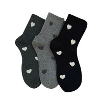 Chaussettes décontractées mi-mollet confortables pour femmes, style automne ; tons noir, blanc, gris, design polyvalent et simple, antidérapantes, en polyester