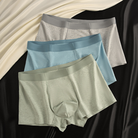 Boxers imprimés sans coutures pour hommes, taille mi-haute, tricotés, respirants, coupe ample, logo à la taille, usage quotidien