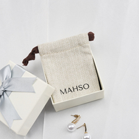 Bijoux en coton biologique imprimé avec logo personnalisé sac à cordon mini collier en coton pochette à bijoux pour boucles d'oreilles