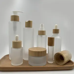 Conjunto de cosméticos vazio 30ml 50ml 60ml 100ml frasco conta-gotas de vidro soro bomba de bambu tampa 120ml 150ml potes de creme com tampa de bambu