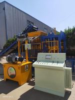 Precio de la Máquina Automática para Fabricar Ladrillos de Cemento QT4-15 con Control PLC, Multivoltaje y 2 Años de Garantía