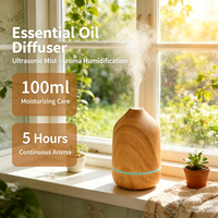 Diffuseur d'huiles essentielles aromathérapeutiques 100 ml au design imitation bois, humidificateur portable à brume froide avec lumière 7 couleurs