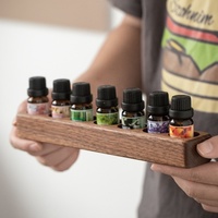 Meilleures ventes transfrontalières : Présentoir de rangement en bois massif pour huiles essentielles de noix, de bureau, à compartiments, pour cosmétiques, modèle simple