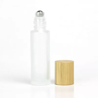 Flacon roll-on en verre dépoli Mingsheng de luxe 5ml 10ml avec bouchon en bambou, flacon vide pour huiles essentielles et parfums, vente en gros