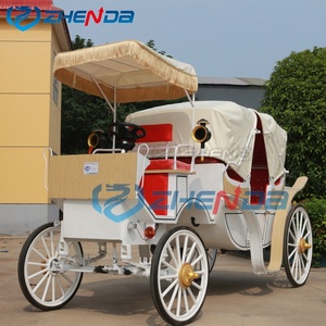 Caravane vintage à toit plat avec pompons blancs, idéale pour un voyage romantique, et bus électrique de tourisme avec sièges rouges. - Product Image 6