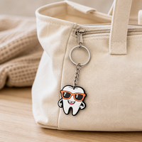 Porte-clés en caoutchouc de haute qualité pour soins dentaires, breloque mignonne en forme de brosse à dents, idéal pour promotion de clinique dentaire, cadeau en gros