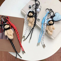REWIN 2025 Mignon Casque Ours Sac à Main Porte-clés Mousqueton Chaîne Clé de Voiture Football Caméra Cordon Tressé Gland Pendentif de Sac Breloques