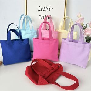 กระเป๋าผ้าใบขนาดเล็กน่ารัก สีสันสดใส ผลิตตามสั่งจากโรงงาน จำหน่ายส่ง สำหรับใส่ของจุกจิก ของชำร่วย ของขวัญงานปาร์ตี้เด็ก ขายปลีกในร้านบูติก - Product Image 3