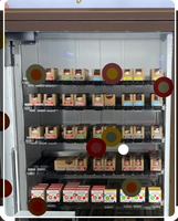 Garantie d'un an Distributeur automatique de cartes à collectionner Machine à gâteau avec ascenseur Distributeur de pièces Paiement Jeton de carte de crédit pris en charge