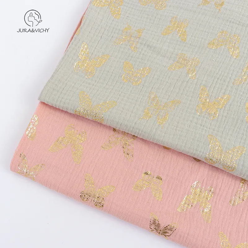 130gsm oro impreso 100% algodón doble capa crepé gasa muselina mariposa dorado tela de lámina para manta de bebé