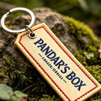 Porte-clés en cuivre brodé de lettres florales vintage OEM, certifié CE, avec étiquette tissée colorée, logo personnalisé, pour sac à main portable