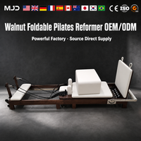 Machine de Pilates Reformer haut de gamme en bois de noyer massif avec plateforme de saut, certifiée CE ISO SGS, équipement professionnel pour studio de yoga