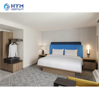 Ensemble de meubles de chambre d'hôtel Hampton Inn de style moderne 5 étoiles, durable, pour usage commercial, style panneau en bois, lit de 1,8 m, tailles et couleurs personnalisées 1