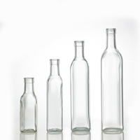 Vente en gros d'huile de cuisine au prix d'usine Bouteille en verre à long col Huile d'avocat et de noyer ambré Huile d'olive camélia avec bouchon à vis
