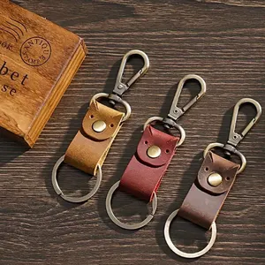Mode porte-clés en cuir véritable à la main en cuir de vachette porte-clés de voiture pour hommes créatif Vintage peau de vache artisanat porte-clés