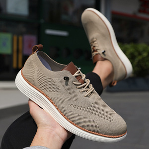 รองเท้าผ้าใบผู้ชายสำหรับกีฬาหลากหลายประเภท เช่น เดิน/วิ่ง/บาสเกตบอล  วัสดุผ้าส่วนบนยืดหยุ่น ซับในผ้าฝ้าย พื้นรองเท้า TPR กันลื่น - Product Image 3