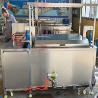 Machine de pasteurisation à bain-marie de type levage hydraulique pour sacs/bouteilles en verre/stérilisation des aliments en conserve