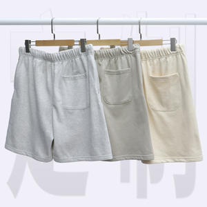 Venta al por mayor de pantalones cortos de rizo francés para hombre con logotipo personalizado 100% algodón Casual Hip Hop estilo patrón sólido técnicas teñidas lisas - Product Image 1