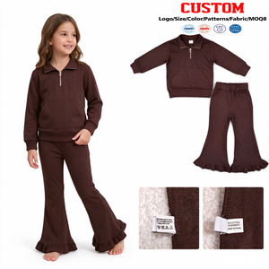 Ensemble sweat-shirt marron à demi-zip et pantalon évasé à volants pour fillettes, style vacances, en coton biologique, de la boutique Trendyism - Product Image 1