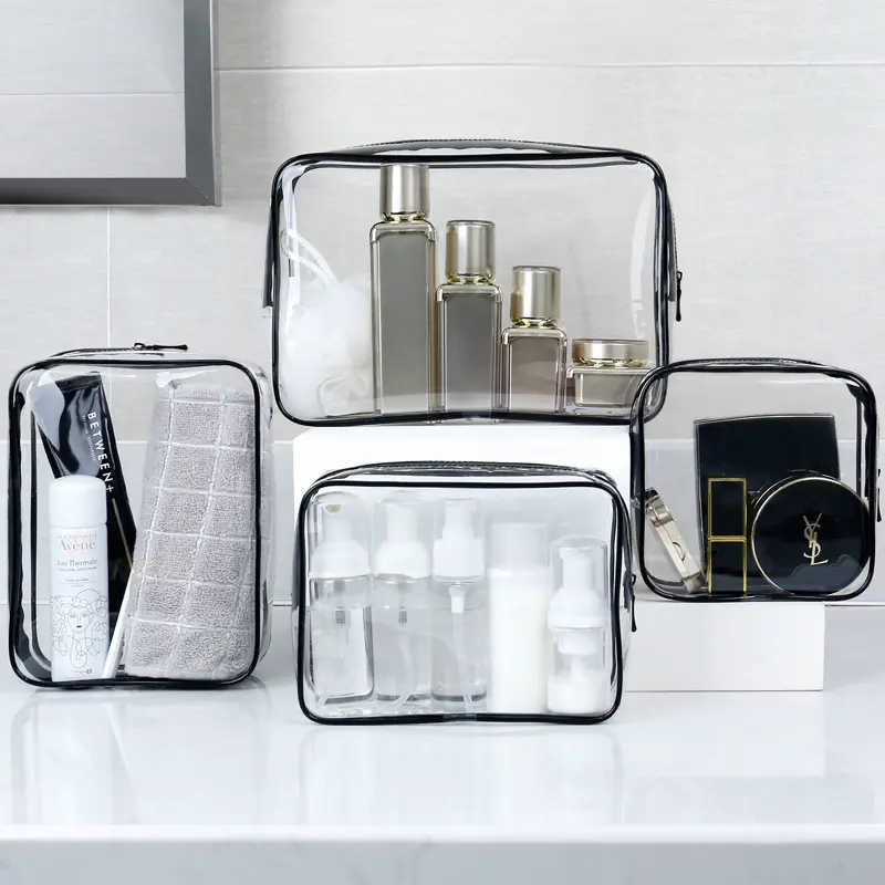 50 조각 사용자 정의 로고 투명 블랙 테두리 메이크업 가방 지퍼 pvc 가방 욕실 여행 휴대용 화장품 가방