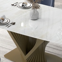 Table à manger avec base en acier inoxydable bronze sculpté en spirale dorée et plateau en pierre frittée brillante ou en marbre