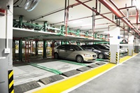 Système de stationnement robotisé à plusieurs étages, système de stationnement automatique des véhicules, parking vertical compact