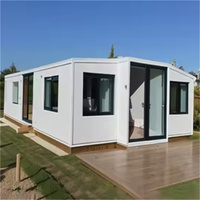 Maison conteneur moderne extensible et respirante, préfabriquée et modulaire, avec cuisine, chambre et salle de bain pour la vie en famille