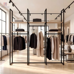 Espositore <span class=keywords><strong>per</strong></span> Abbigliamento Moderno e Minimalista, Scaffale Multifunzionale in Tubo d'Acciaio Nero, Arredamento di Alta Gamma <span class=keywords><strong>per</strong></span> Negozi di Abbigliamento - Product Image 3