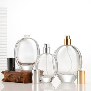 Bouteilles de parfum rondes plates de 30ml 50ml 75ml avec couvercle noir et pulvérisateur à pompe Bouteilles de parfum rondes Vente en gros <span class=keywords><strong>pas</strong></span> <span class=keywords><strong>cher</strong></span> - Product Image 2