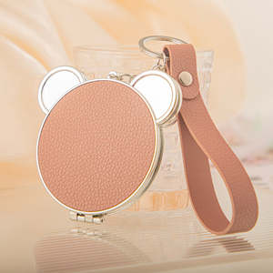 <b>Cute</b> <b>Bear</b> Head Shaped PU Leather Compact Mirror with Keychain Double Sided Folding Travel Mirror With Plastic Frame Strap - Product Image 1